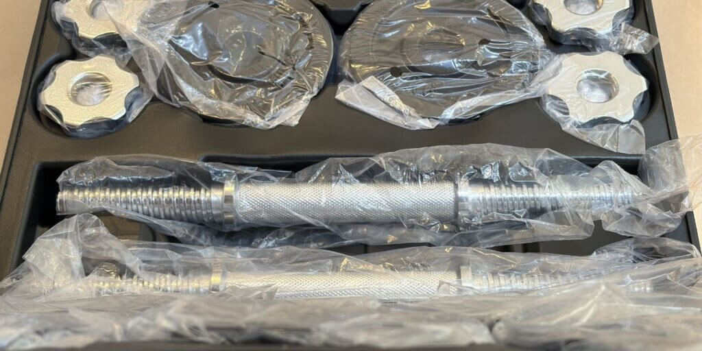 Anko dumbbell set with each item wrapped in plastic.